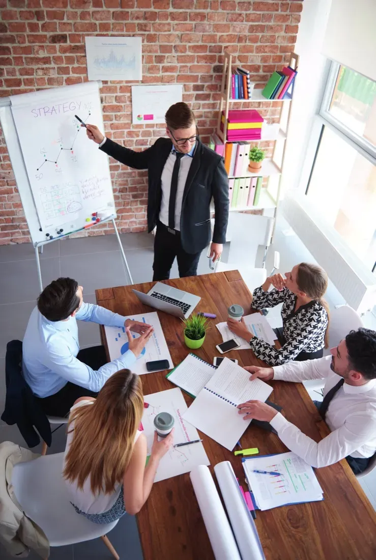Team reviewing the structure of a website in a meeting